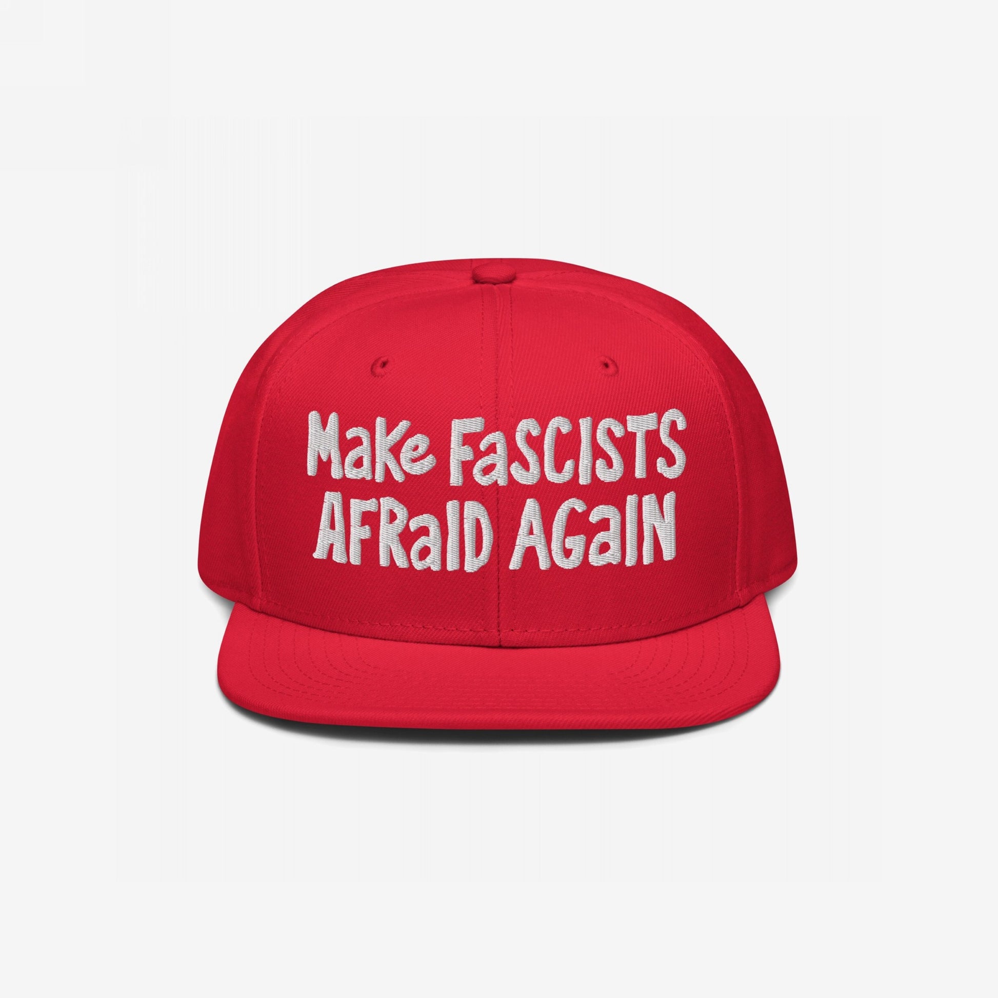 Red snapback cap with bold, white embroidered text: Make FASCISTS AFRAID AGAIN. A statement piece for unapologetic resistance, embodying defiance and activism.