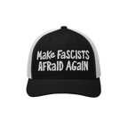 Black-and-white trucker-style baseball cap featuring bold white embroidery with the slogan “Make Fascists Afraid Again,” 
