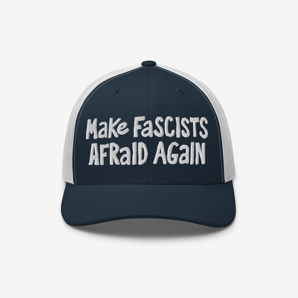 Make Fascists Afraid Again Hat features navy front and bill with white mesh back. Bold white embroidery showcases defiance, perfect for protests or casual wear supporting equality and resisting fascism.