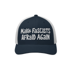 Make Fascists Afraid Again Hat features navy front and bill with white mesh back. Bold white embroidery showcases defiance, p