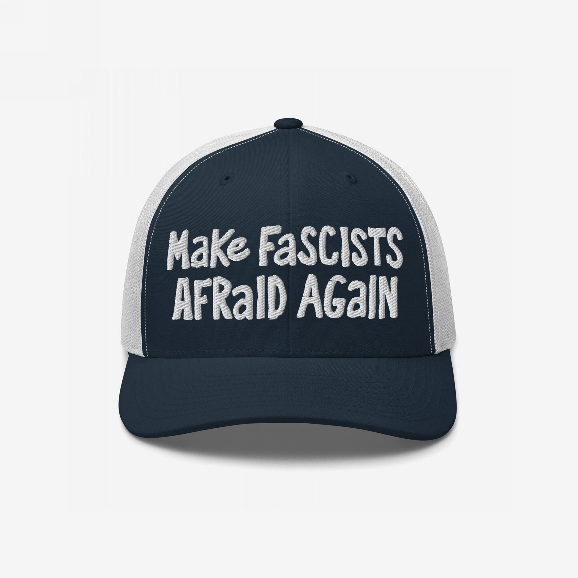 Navy-blue and white mesh Make Fascists Afraid Again trucker cap with bold, hand-drawn style embroidery, embodying unapologetic resistance. Ideal for activism or everyday wear, supporting Amnesty International.