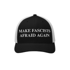 Make Fascists Afraid Again Classic Hat features a bold anti-fascist slogan in white embroidery on a black-and-white mesh truc