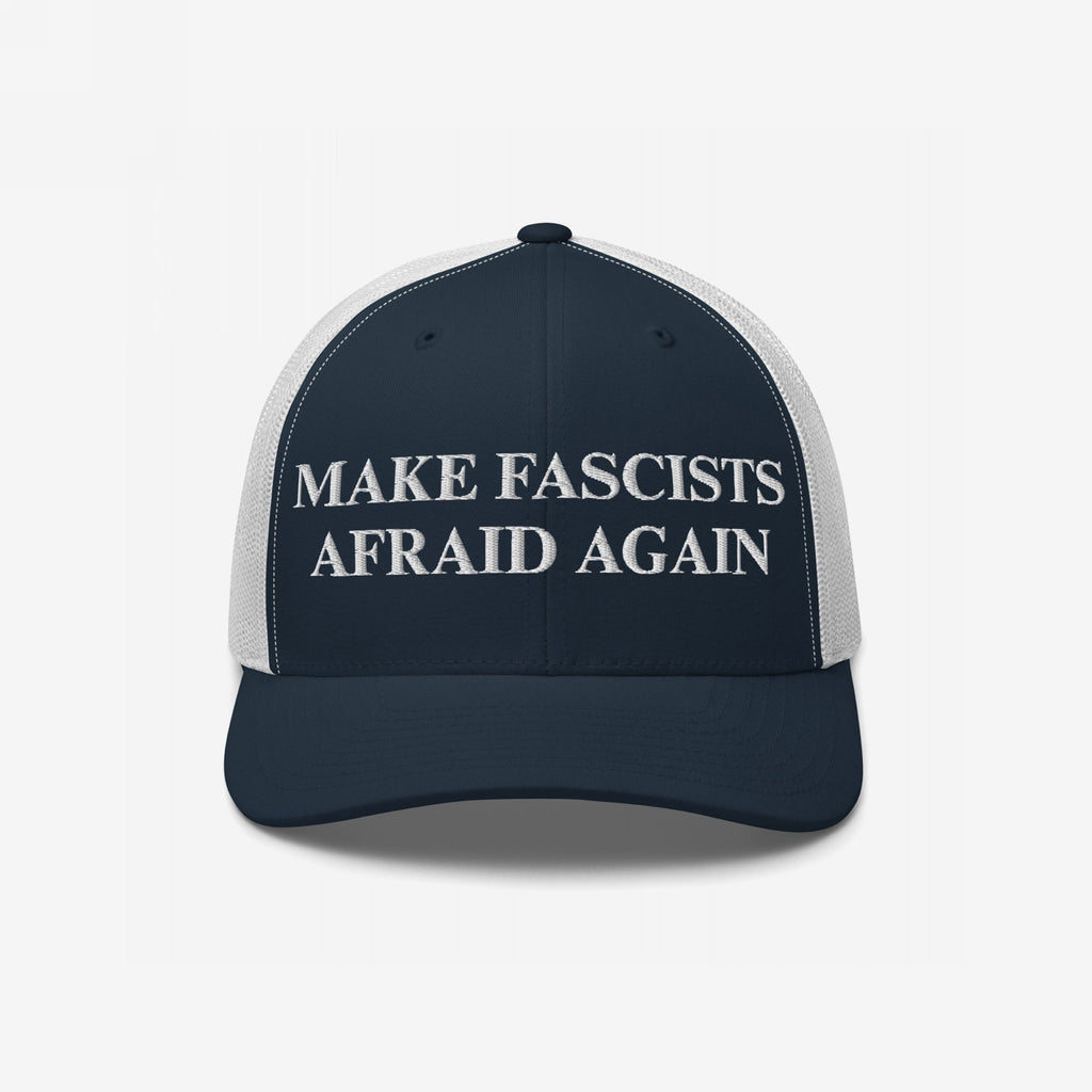 The Make Fascists Afraid Again Classic Hat features a navy-blue and white mesh-back with bold white embroidery, perfect for showcasing your anti-fascist stance and commitment to equality.