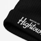 Close-up of the Mayor Of Hightown Hat, a black rib-knit beanie with Mayor of Hightown embroidered in white, exemplifying cannabis culture's bold humor and carefree spirit.