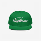 Bright green snapback cap with Mayor of Hightown in white embroidery, embodying bold, cheeky cannabis culture style, ideal for those seeking carefree vibes and elevated humor in their headwear.