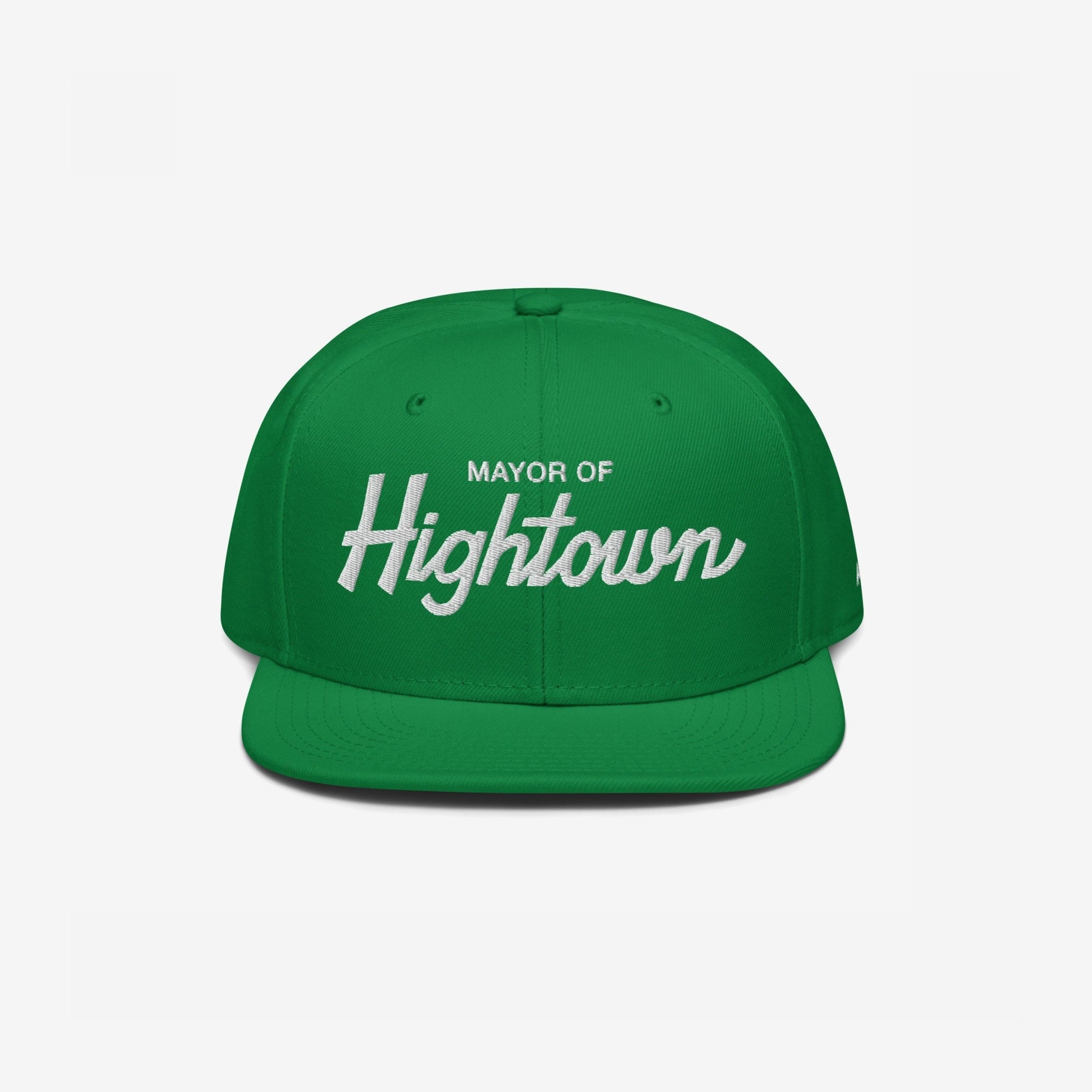 Bright green snapback cap with Mayor of Hightown in white embroidery, embodying bold, cheeky cannabis culture style, ideal for those seeking carefree vibes and elevated humor in their headwear.