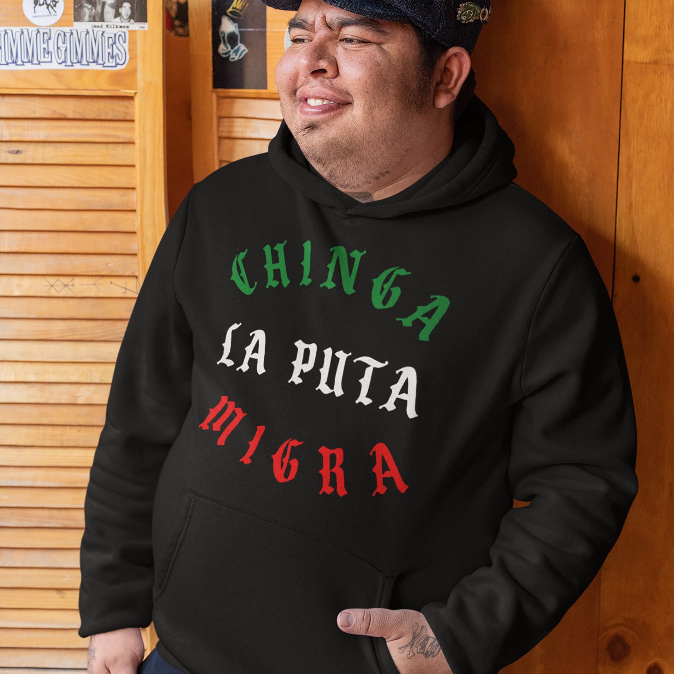 Chinga La Migra Mexico Hoodie features bold green, white, and red text on black, advocating immigrant rights. Ideal for anti-fascist supporters, this design embodies resilience and activism.