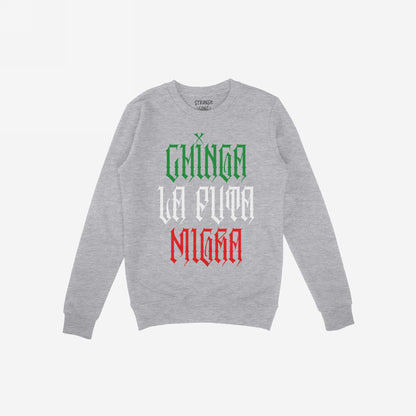Heather-gray crewneck sweatshirt titled Chinga La Migra Mexico Hoodie & Sweatshirt features a bold three-line slogan in Gothic typeface, reflecting Mexican flag colors, symbolizing resistance and unyielding spirit.