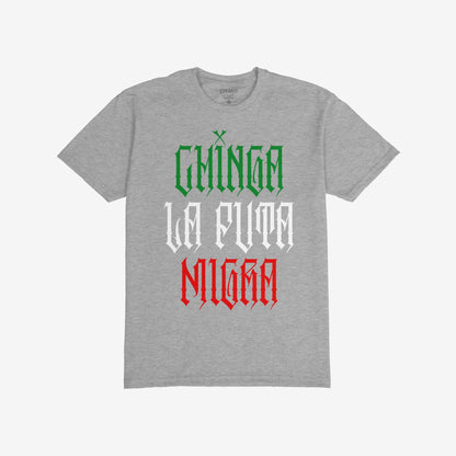 Heather-gray Chinga La Migra Mexico T-shirt with a Gothic-style slogan in Mexican flag colors, advocating cultural pride and resistance against anti-immigrant systems, embodying a bold stance for equality and justice.