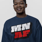 Smiling man in a navy-blue sweatshirt featuring MN AF in distressed white and textured red block print, representing Minnesota As Fuck Anti-Fascist Hoodie & Sweatshirt, symbolizing equality and anti-fascism.