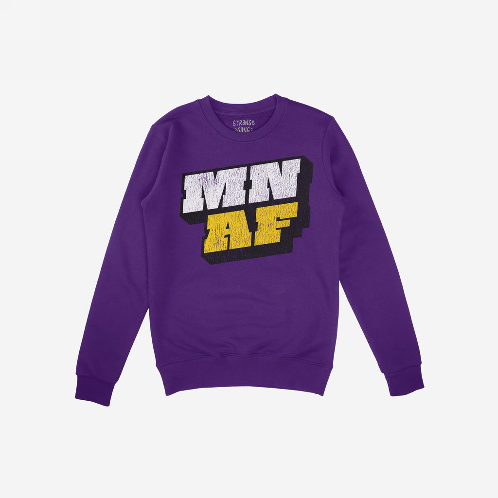 Purple crew-neck sweatshirt featuring MN AF in distressed white and yellow print, embodying Minnesota pride and anti-fascist sentiment. Long sleeves with ribbed cuffs and hem, branded inside collar.