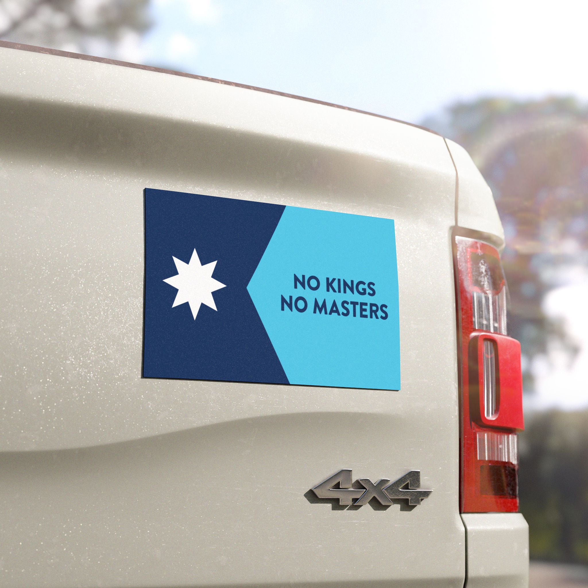 Minnesota Flag No Kings Sticker & Magnet displayed on a white 4×4 vehicle's tailgate, featuring a seven-pointed star and the slogan, NO KINGS NO MASTERS, symbolizing resistance and state pride.