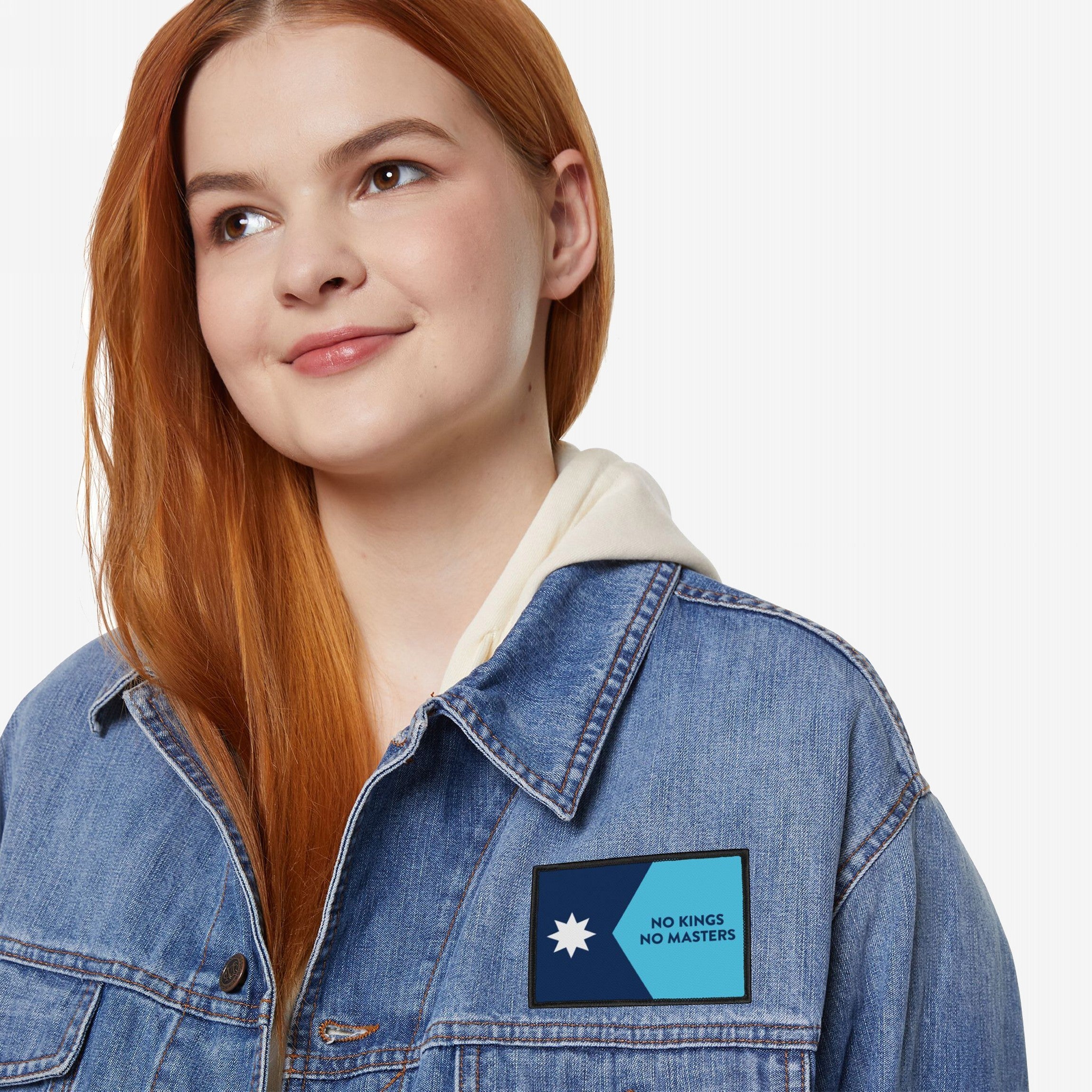 Minnesota Flag No Kings Patch on denim jacket, features a two-tone blue design with a star and NO KINGS NO MASTERS text, symbolizing defiance and autonomy.