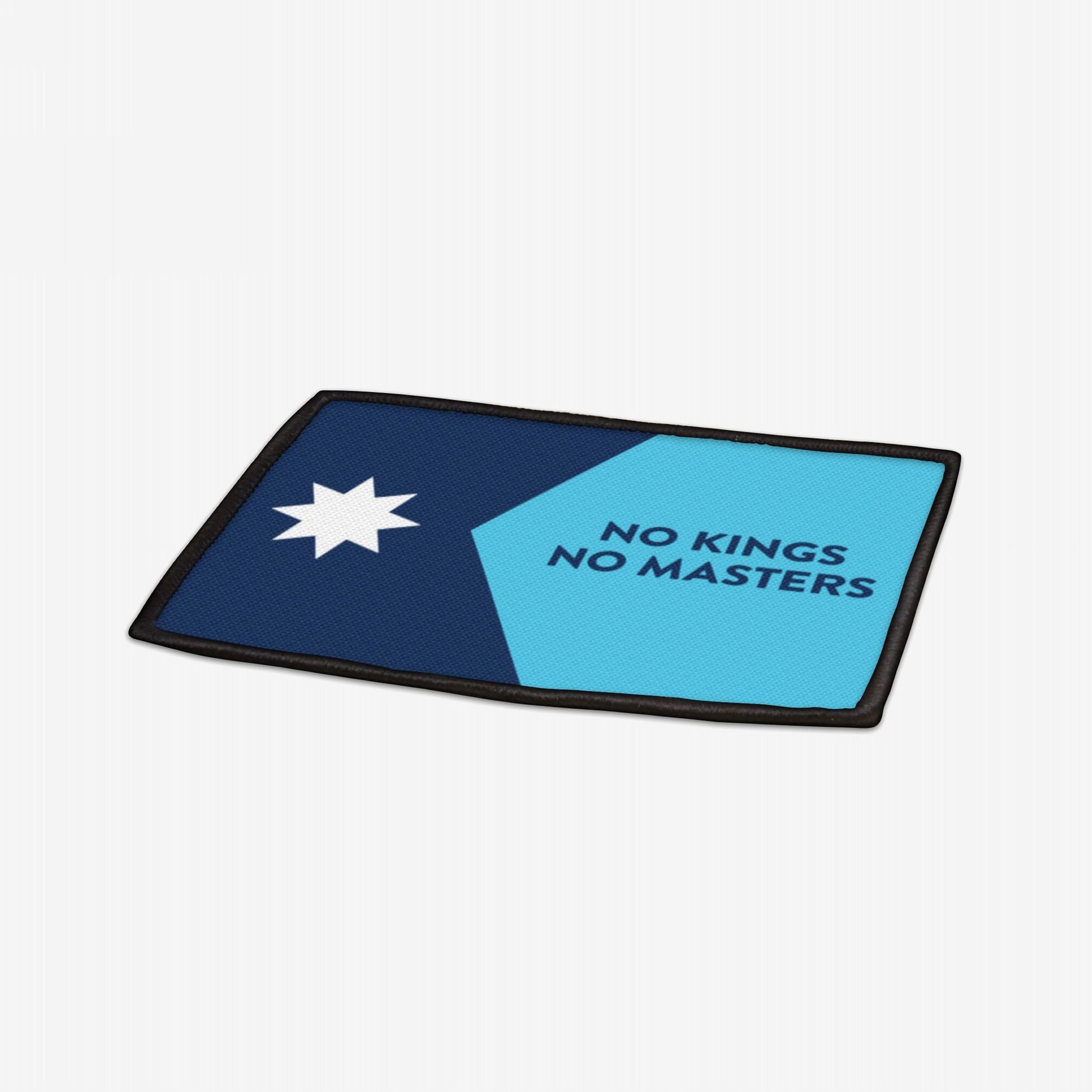 Minnesota Flag No Kings Patch features a dark and light blue split design with a seven-pointed star and the slogan NO KINGS NO MASTERS, symbolizing autonomy and resistance.