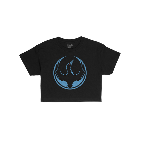 The Minnesota Rebel Alliance Women's Baby Tee features a bold loon emblem in blue with a red eye, symbolizing resistance. The