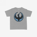 Minnesota Rebel Alliance Women's Baby Tee in light heather gray, featuring a circular emblem with a stylized black bird, blue accents, and red eye, symbolizing support for immigrant rights and equality.