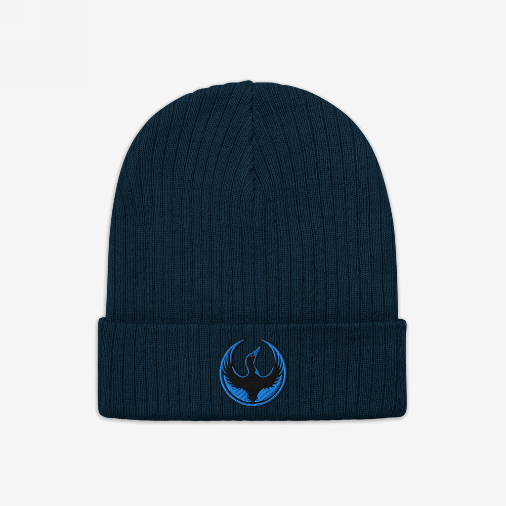 Minnesota Rebel Alliance Hat: A dark navy knit beanie featuring a ribbed texture and a circular emblem with a blue stylized bird and red eye, symbolizing resistance and community support.