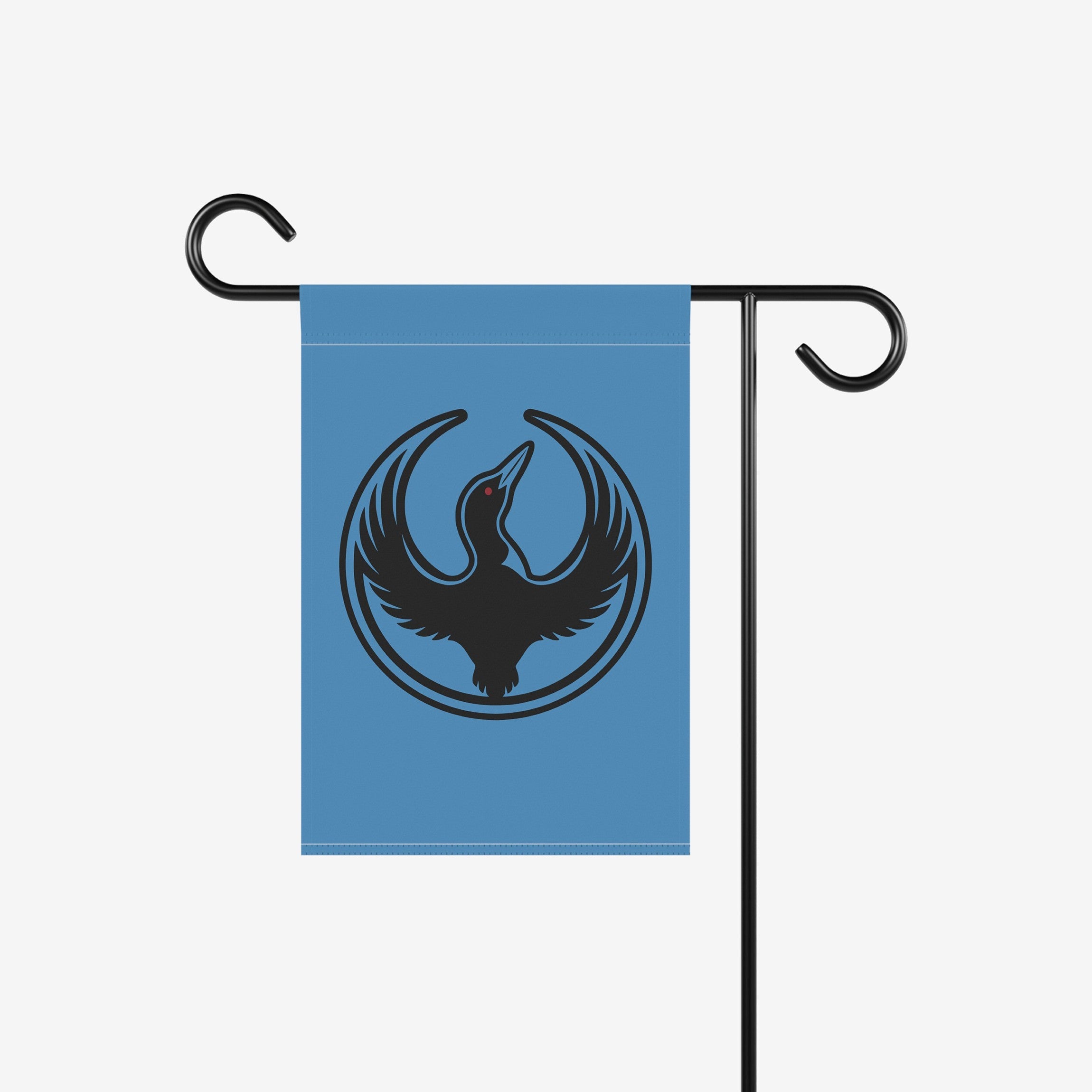 The Minnesota Rebel Alliance Garden Flag showcases a stylized loon with wings spread, symbolizing resistance. This blue flag on a metal stand represents solidarity for equality and immigrant rights.