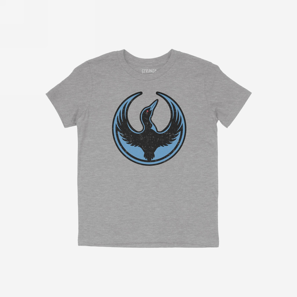 Heather-gray Minnesota Rebel Alliance T-shirt featuring a stylized black loon with raised wings on a blue circle badge, symbolizing defiance. The shirt embodies bold expression and supports equality.