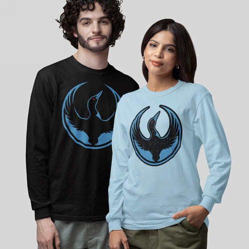 Two people wear Minnesota Rebel Alliance T-shirts, featuring a stylized loon in flight. The man sports a black version; the woman, light-blue, embodying bold, meaningful design.