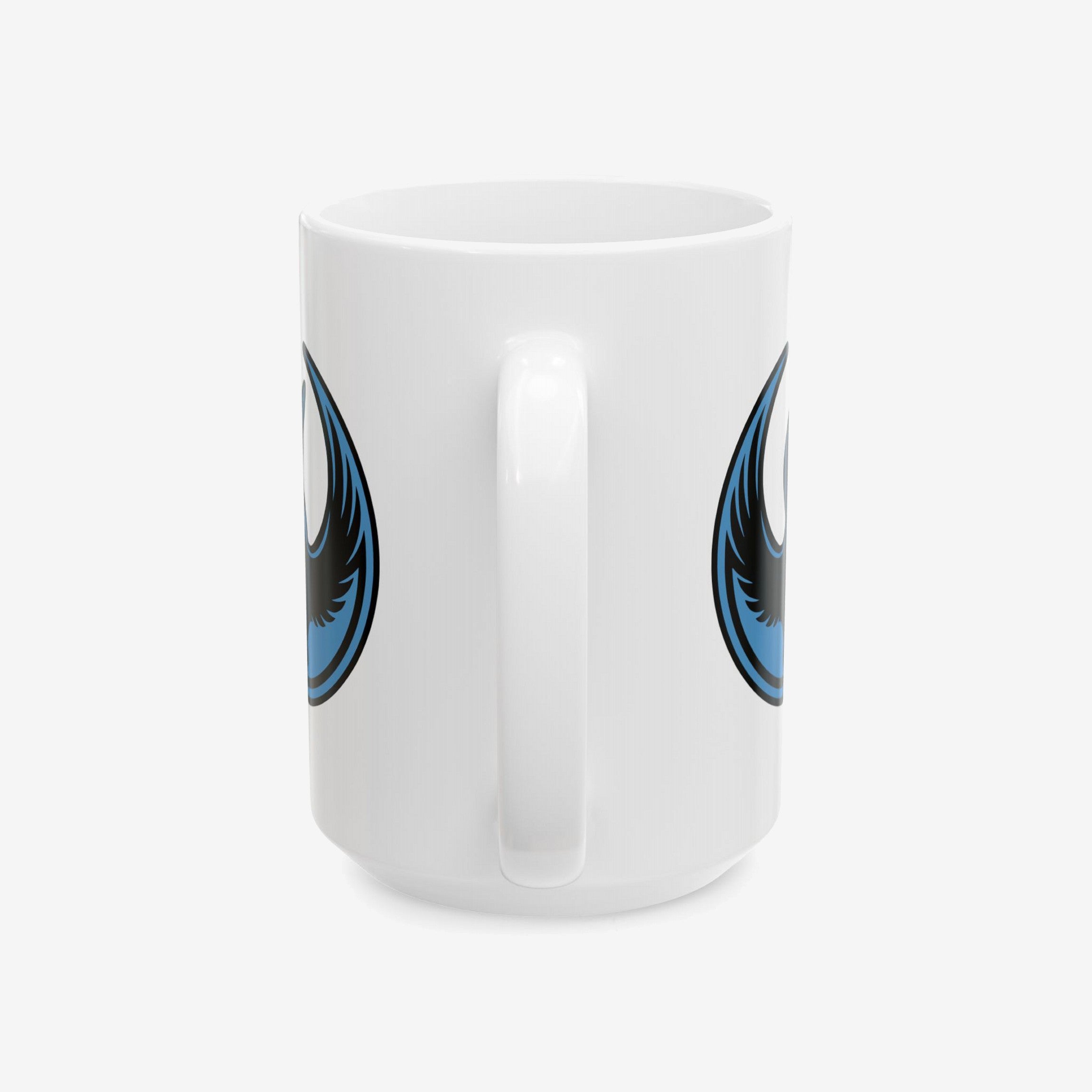 Minnesota Rebel Alliance Mug featuring a blue-and-black wing emblem inside a circle, displayed with the handle centered, symbolizing resistance and support for immigrant rights.