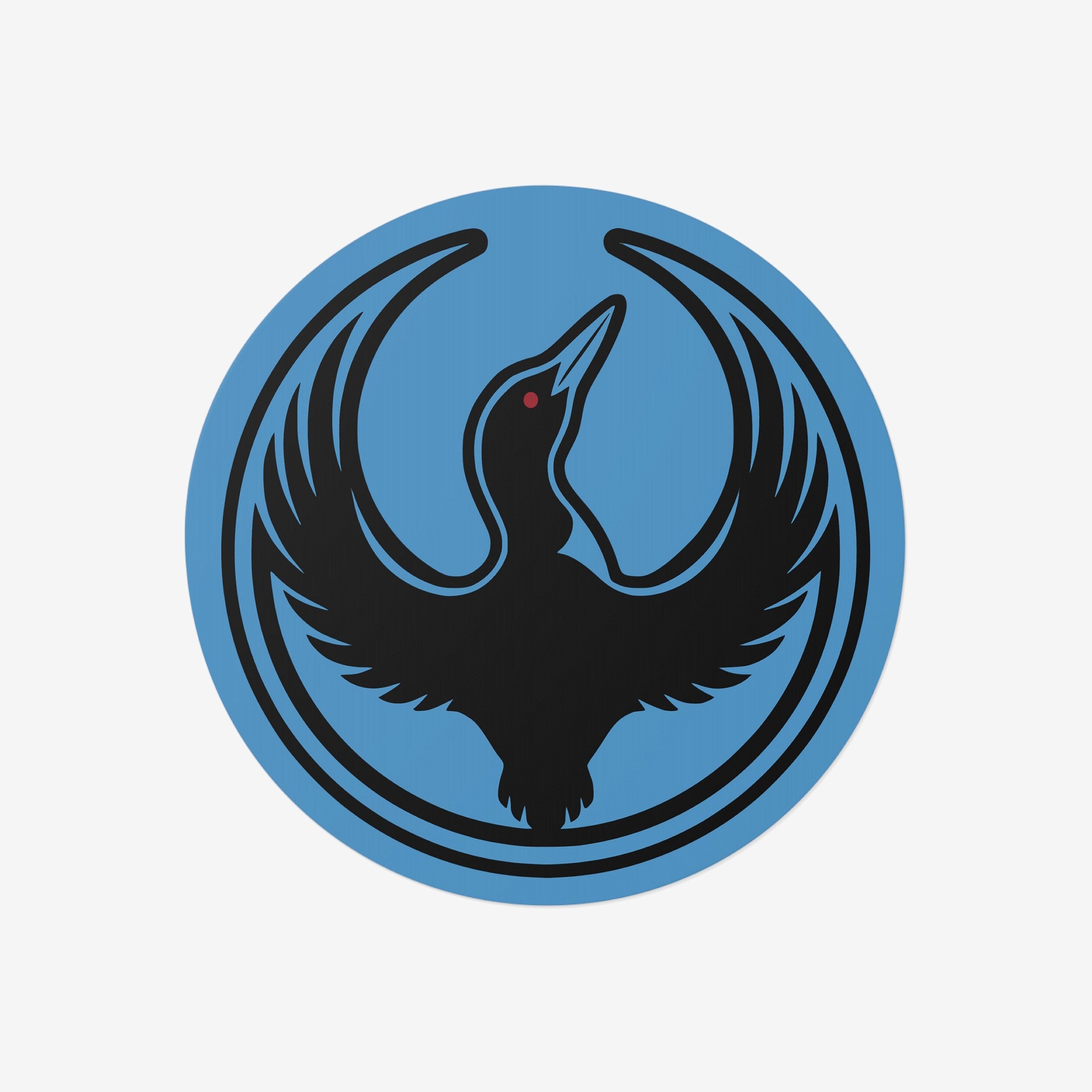 Minnesota Rebel Alliance Sticker featuring Bernie Anderson’s stylized loon logo, a black bird in flight on a blue circular emblem, symbolizing resistance and immigrant rights advocacy. Available in 3” or 5” vinyl sizes.