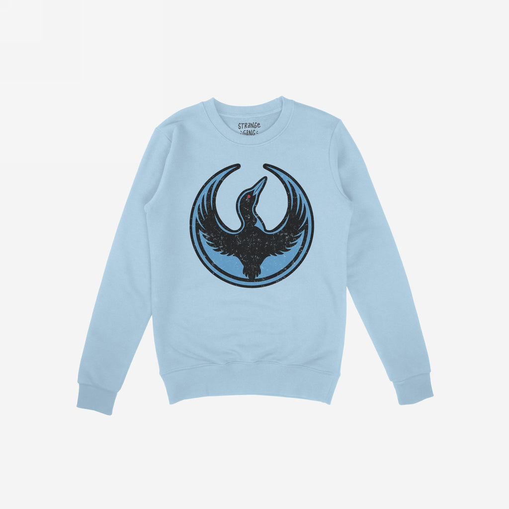 Minnesota Rebel Alliance Hoodie & Sweatshirt in light blue, featuring a distressed black bird graphic with a red eye. Perfect for advocates of equality and immigrant rights, this sweatshirt symbolizes bold activism.