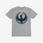Heather-gray Minnesota Rebel Alliance T-shirt featuring a stylized loon emblem with wings raised and a red eye, symbolizing boldness and resistance. The shirt's design reflects a commitment to equality and social justice.