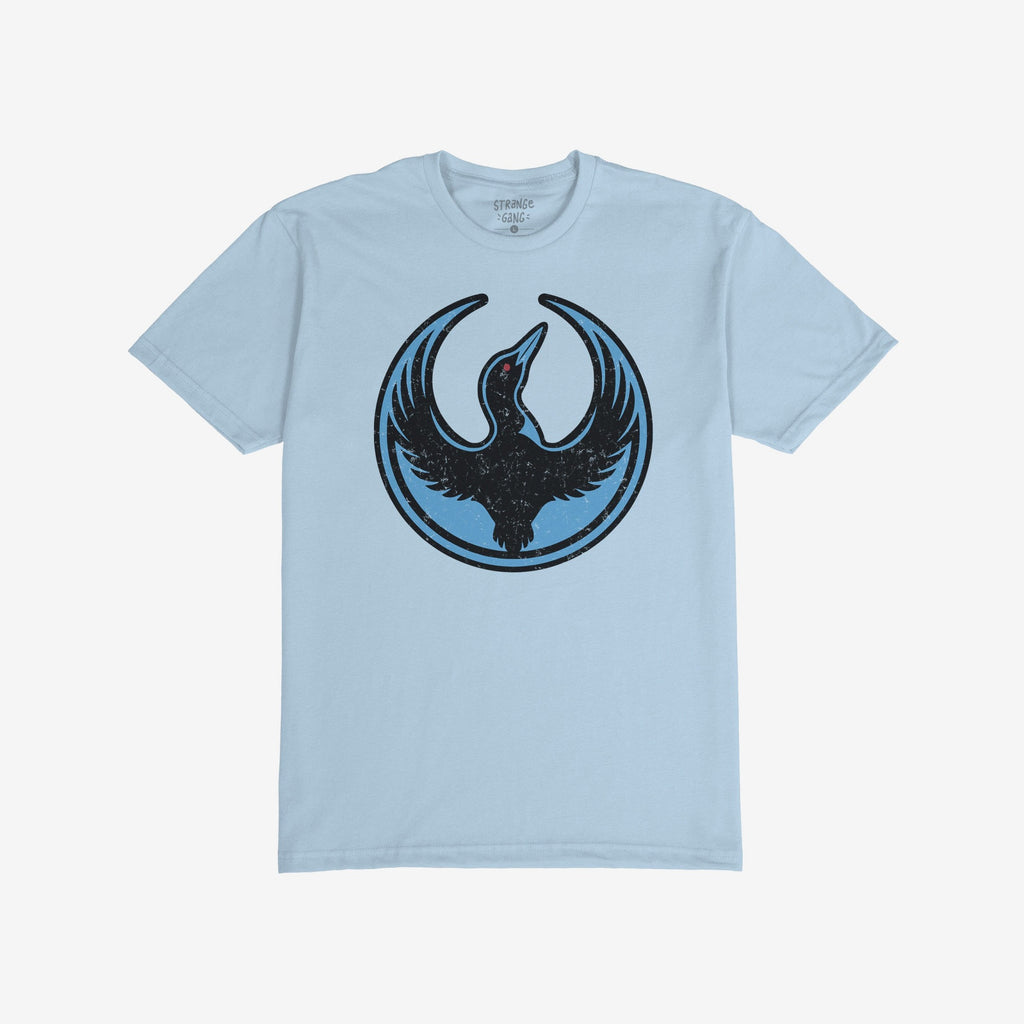 Minnesota Rebel Alliance T-shirt in light-blue, features a distressed graphic with a black loon emblem in a vintage style, symbolizing defiance and unity. Perfect for expressing bold statements.