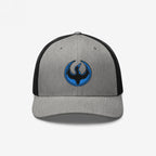 Minnesota Rebel Alliance Hat: gray-and-black trucker cap featuring a stylized phoenix emblem, symbolizing resistance and community support, with a black outline, blue accents, and a red eye.