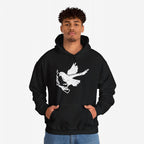 Young man models the Molotov Messenger Shirt, a black hoodie featuring a distressed white graphic of a dove holding a flaming Molotov cocktail, symbolizing defiant peace and activism.