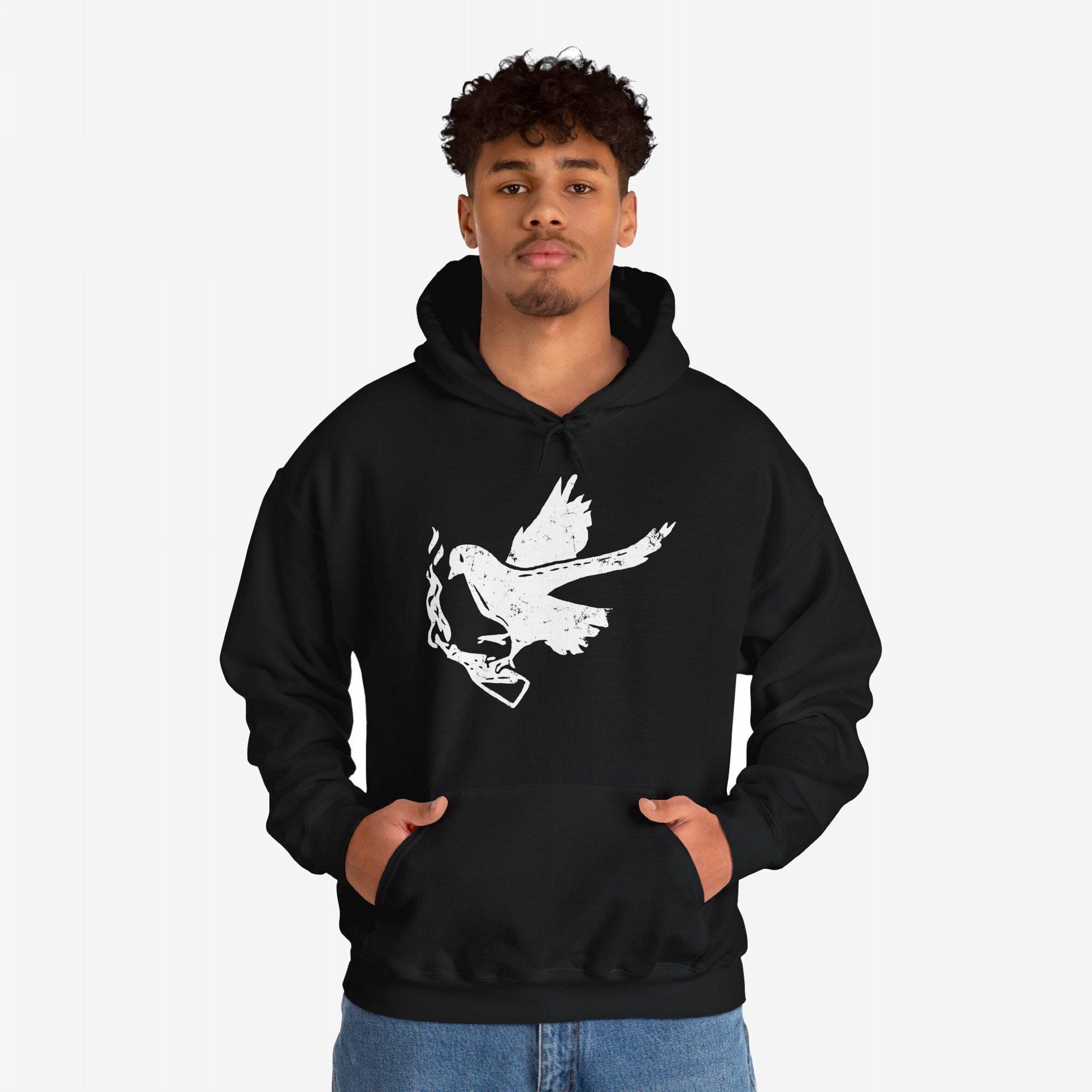 Young man models the Molotov Messenger Shirt, a black hoodie featuring a distressed white graphic of a dove holding a flaming Molotov cocktail, symbolizing defiant peace and activism.