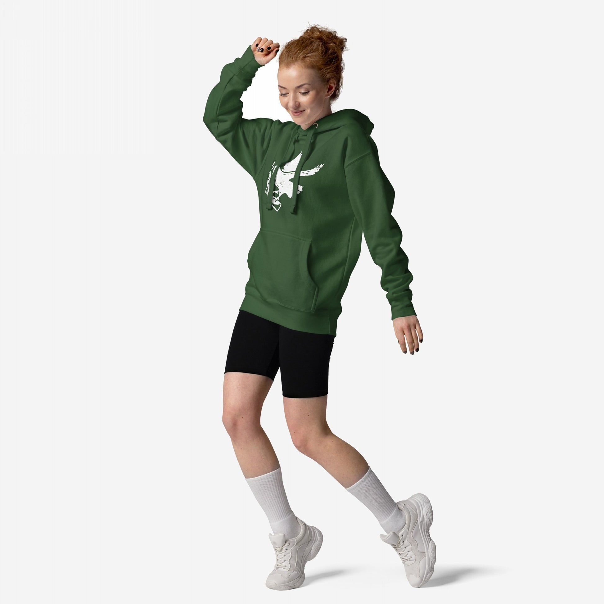 Young woman in mid-step wearing the Molotov Messenger Hoodie, featuring a white dove with a Molotov cocktail graphic, paired with black shorts and white sneakers, embodying a bold, symbolic style.