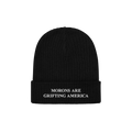 A black ribbed cuffed beanie with white embroidery on the front that reads "MORONS ARE GRIFTING AMERICA." This anti-MAGA bean