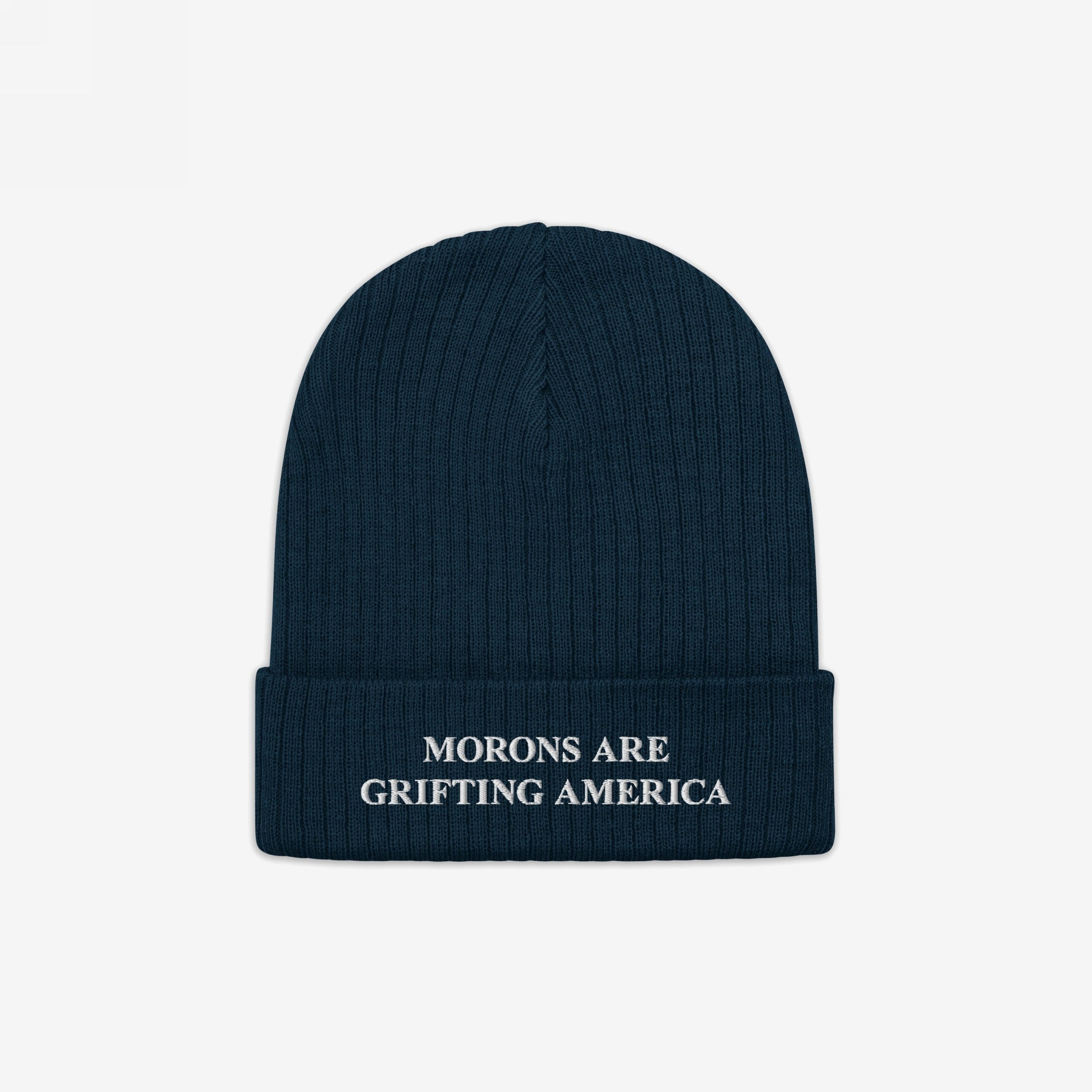A navy blue ribbed beanie with a cuffed brim and white embroidery reading "MORONS ARE GRIFTING AMERICA." This anti-MAGA beanie offers a minimalist, winter-ready statement with a conscience.