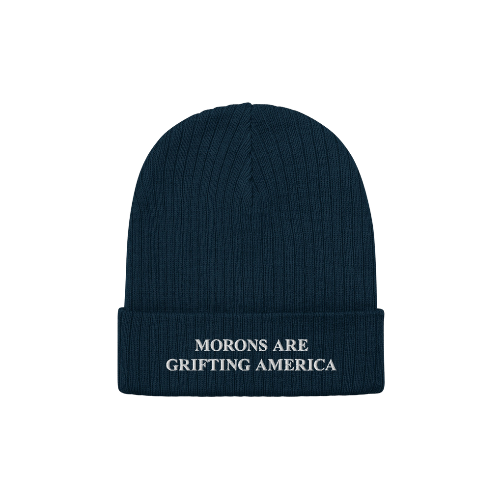 A navy blue ribbed beanie with a cuffed brim and white embroidery reading "MORONS ARE GRIFTING AMERICA." This anti-MAGA beani