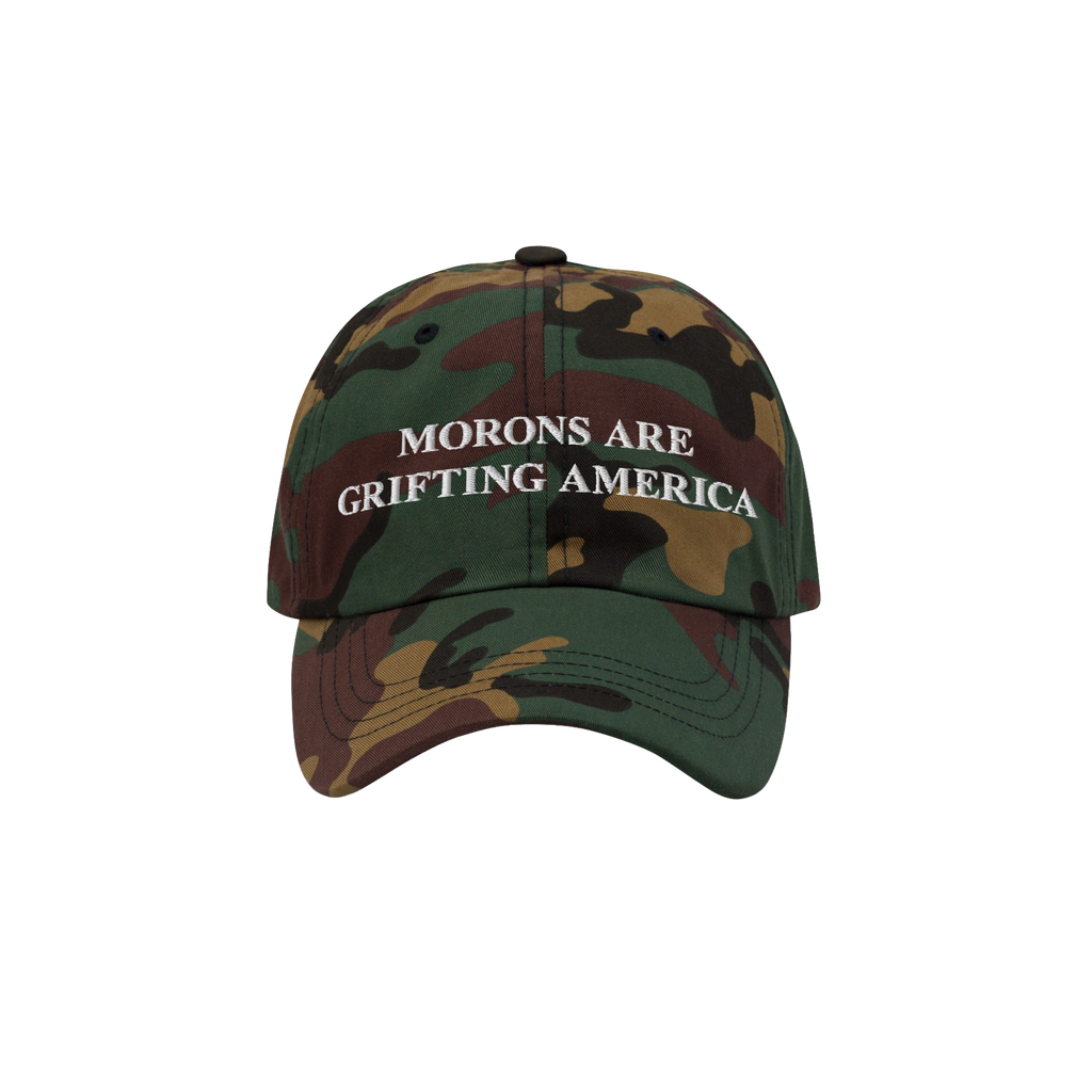 Camouflage dad hat featuring white "Morons Are Grifting America" text stitched on the front — a rebellious, anti-MAGA desig