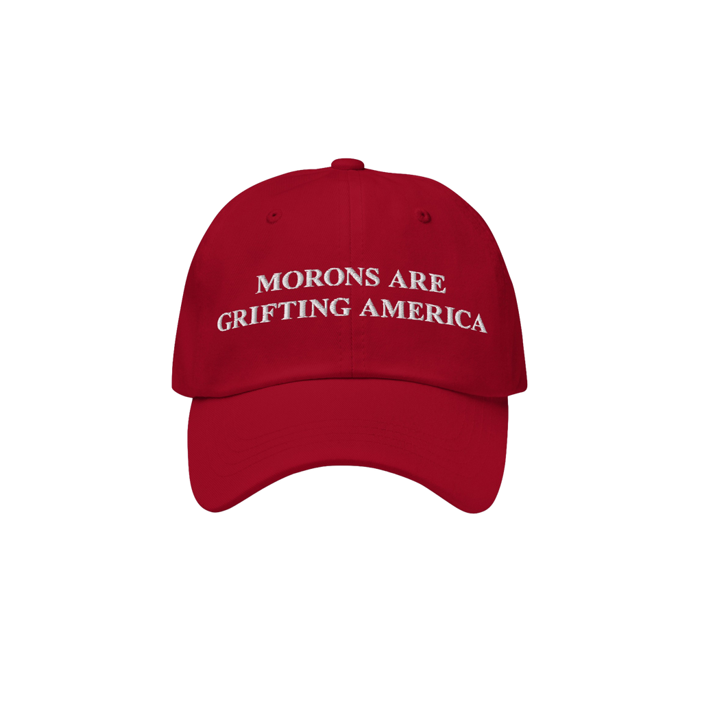 Red dad hat styled to mimic MAGA caps but flipped with embroidered white text "Morons Are Grifting America" — a direct anti