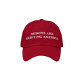 Red dad hat styled to mimic MAGA caps but flipped with embroidered white text "Morons Are Grifting America" — a direct anti