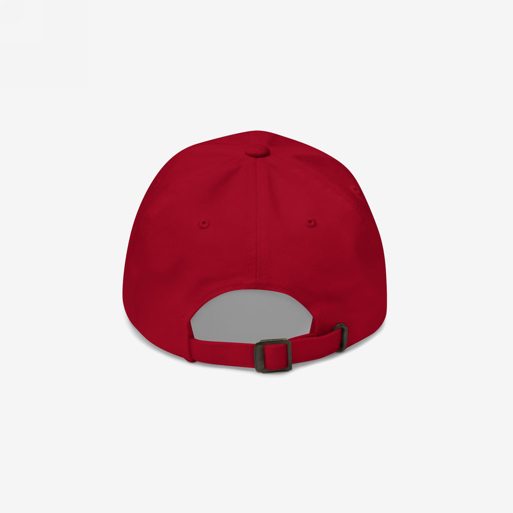 Rear view of the red dad hat with adjustable brass buckle and soft crown — a clean, functional design with sharp anti-MAGA front messaging.