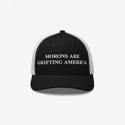 Retro black and white trucker hat with bold anti-MAGA message embroidered in white: "Morons Are Grifting America"