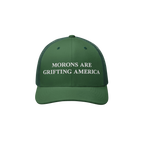 Retro green trucker hat featuring embroidered anti-MAGA message: "Morons Are Grifting America"