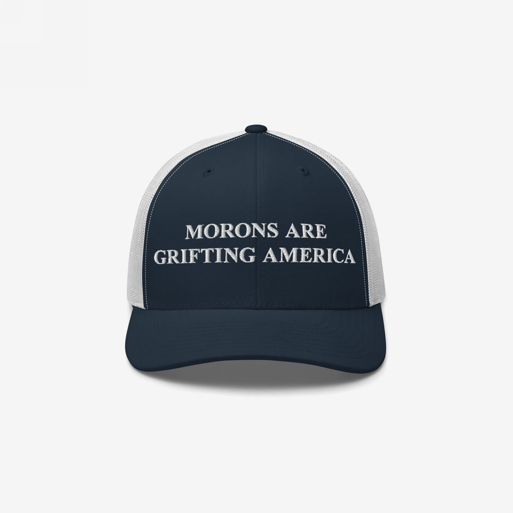Classic navy blue and white retro trucker hat with anti-MAGA slogan: "Morons Are Grifting America"