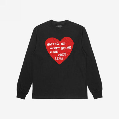 Black long-sleeve No Hate T-shirt featuring a distressed red heart with the phrase “HATING ME WON’T SOLVE YOUR PROBLEMS” in bold white letters, symbolizing bold activism and pride.