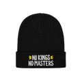 The No Kings No Masters Hat features a black rib-knit design with a fold-over cuff, showcasing the slogan “NO KINGS NO MAST