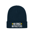 No Kings No Masters Hat: Dark navy-blue ribbed knit beanie with “NO KINGS NO MASTERS” embroidered in white, accented by y