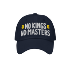Navy-blue cap with NO KINGS NO MASTERS in white, accented by gold crowns. An anti-establishment statement piece for those who