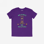 Purple T-shirt titled No Kings No Masters features a stylized guillotine with cartoon heads, symbolizing anti-authoritarian defiance. Text above reads “NO KINGS,” below “NO MASTERS.” Collar label visible.