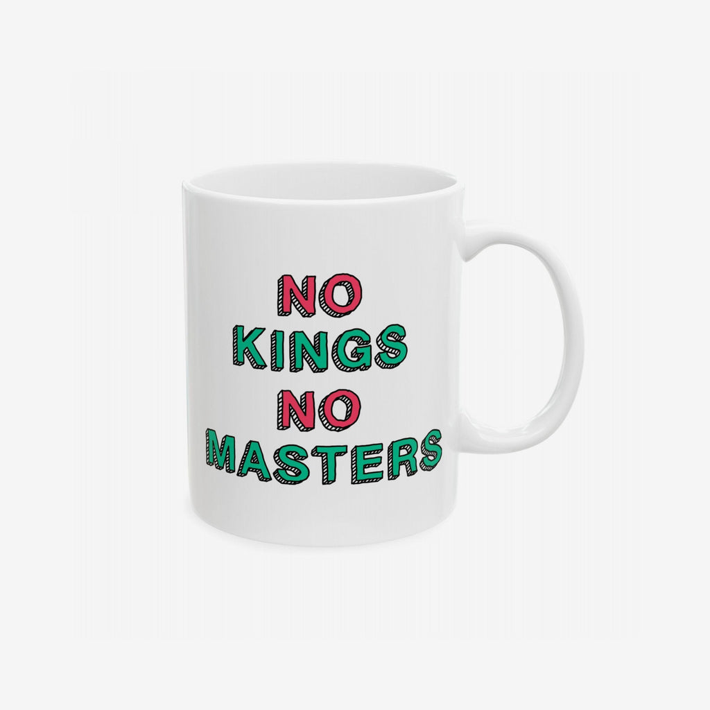 The No Kings No Masters Mug features hand-lettered “NO KINGS NO MASTERS” in pink and green, perfect for those embracing defiance and social justice, dishwasher-safe and available in two sizes.