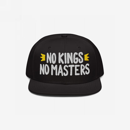 No Kings No Masters Hat features bold white embroidery of the phrase, flanked by yellow crowns, on a black snapback. This rebellious design aligns with a stance against hierarchy and for equality.